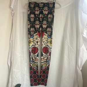 Stretchy semi-shiny unique skeleton leggings, like new